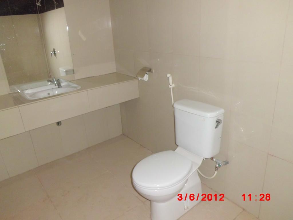 Galaxy Inn Baubau Pokoj fotografie