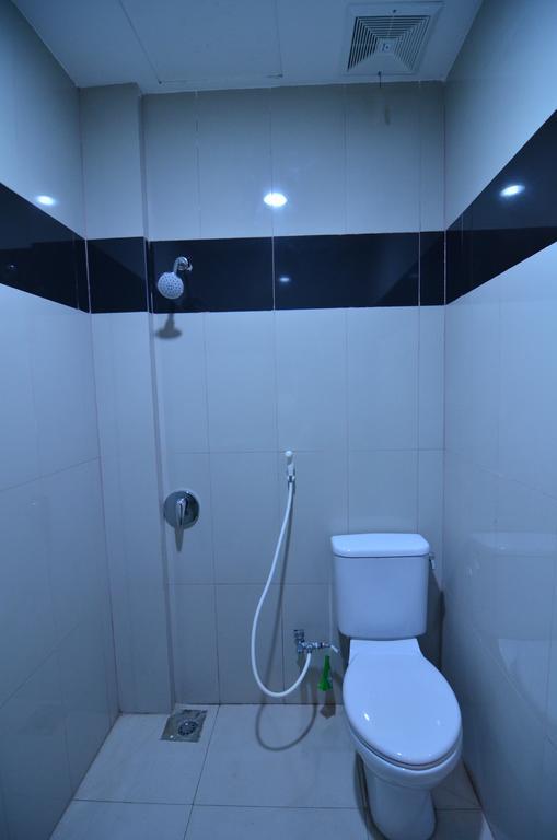 Galaxy Inn Baubau Pokoj fotografie